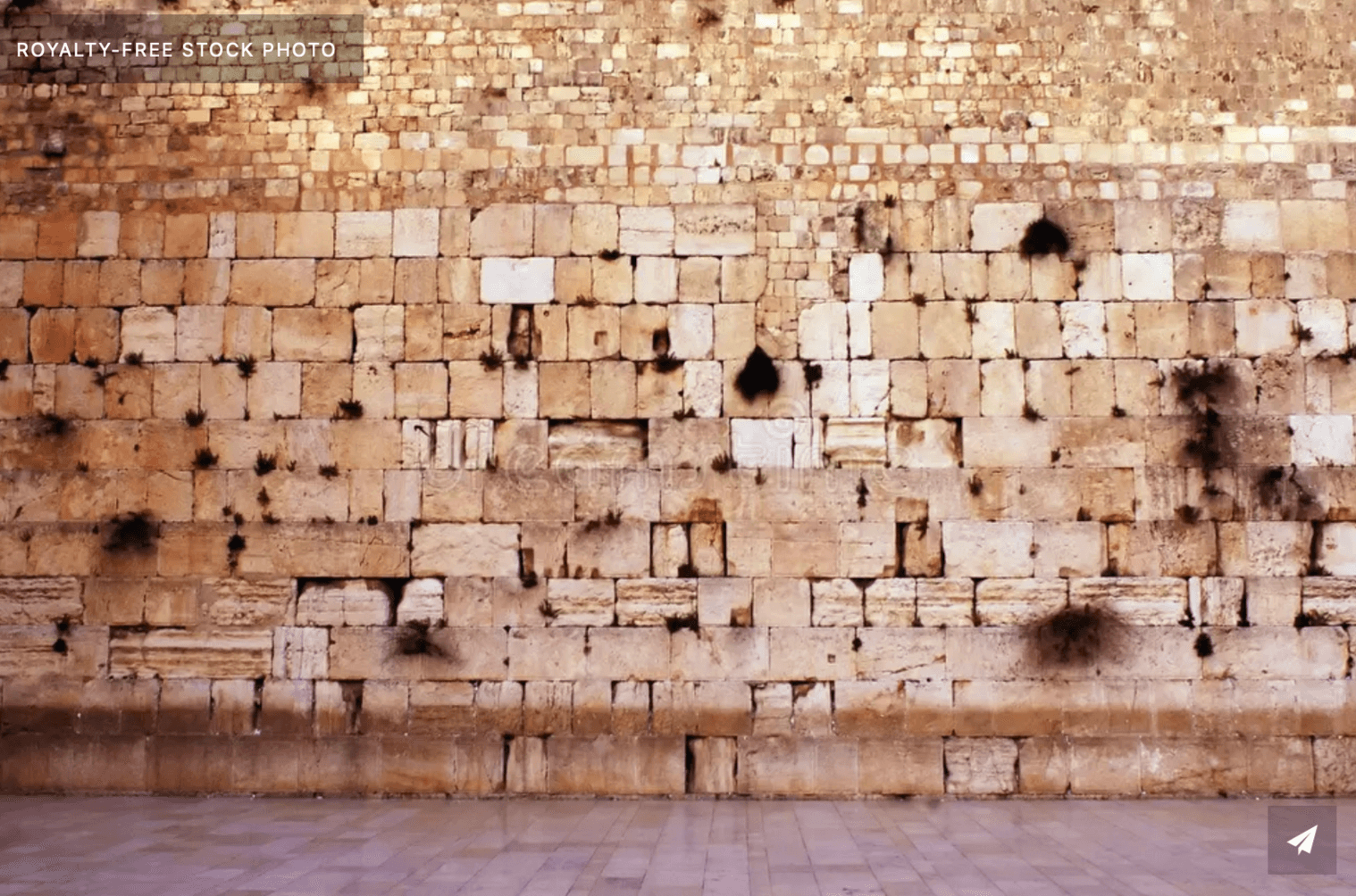 A grand, temple-like interior with large marble pillars and a divine light shining from above.
